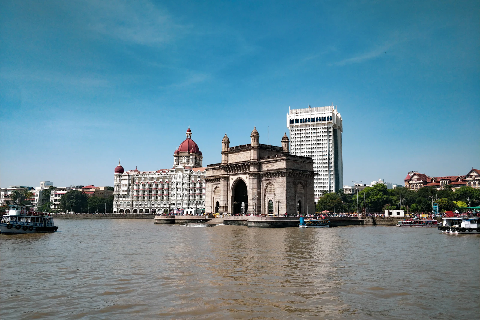 The Gateway of India and the Taj Mahal Palace hotel seen from the water on the Mumbai waterfront